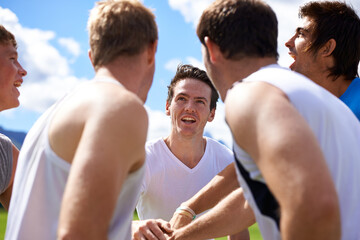 Men, group and huddle for sport on field with motivation, support and cheer for challenge with fitness. People, team building and circle with solidarity for contest, competition or workout in game