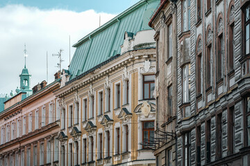 Beautiful tenement houses on November 11 Street. Bielsko-Biala. Richly decorated tenement houses. The mansard roof is covered with patinated copper sheets