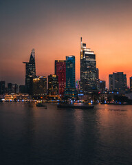 A sunset view of Ho Chi Minh city from over the Mekong river