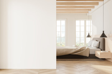 White master bedroom interior with cozy bed and blank wall