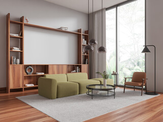 White living room corner with green couch