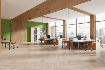 Modern business interior with pc monitors on desk, shelf with panoramic window