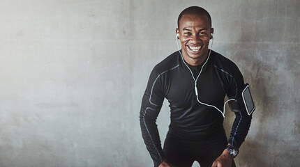Man, portrait and music for fitness outdoor with listening, podcast or exercise for healthy body with mockup. Athlete, african person or earphones with arm pouch for phone, radio or happy for workout