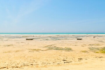 Fototapeta premium Scenic view of moored boat at Jambiani beach, Zanzibar