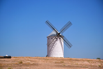 Ancient windmill  in Campo de Criptana, Spain, defined in Cervantes' Don Quixote "The Giants"