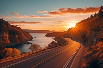 Beautiful scenic view of lake and winding road at sunset, tranquil nature landscape for stock photo