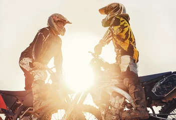 Türaufkleber Sport, racer or people on motorcycle outdoor on dirt road with relax after driving, challenge or competition. Motocross, lens flare or dirtbike driver or friends on offroad course or path for sunset © Jeff Bergen/peopleimages.com