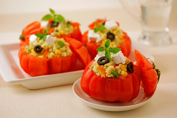 Stuffed tomatoes with millet.