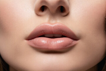 Close-up on girl beautiful lips and jaw line