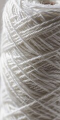 Close-up of Colorful White Thread Bobbin - Sewing and Dressmaking Accessory