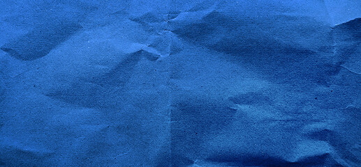 grunge old blue paper texture use as background with blank space for design. kraft blue wrinkle recycle paper background. rough paper texture for art concept.