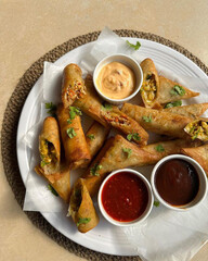 wings with sauce and bread rolls