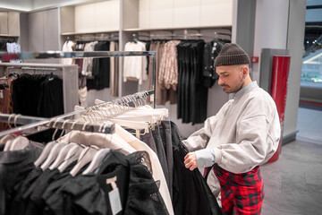 person choosing clothes