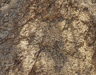 Rock surface with cracks. Natural rock structure. Brown texture. of Stone. Rock texture. Surface of Wild Stone