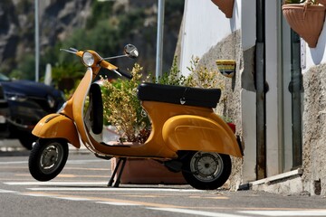 vintage scooter parked on the street