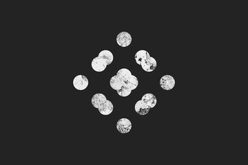flat white grunge logo effect of geometric shapes on dark background.