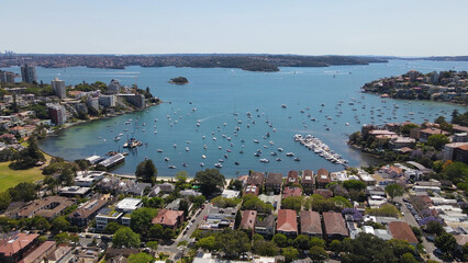 Aerial drone view of homes and streets above the harbourside suburb of Double Bay in east Sydney,...