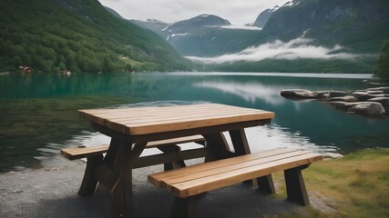 Picnic wooden bench  table near lake in the mountains - obrazy, fototapety, plakaty
