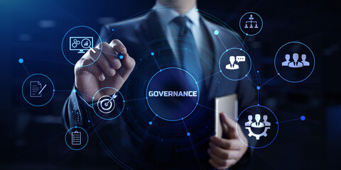 Governance ESG concept. Businessman pressing button on screen.
