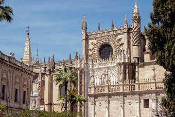 exterior architecture of Cathedral church in Seville, Spain - 744583290