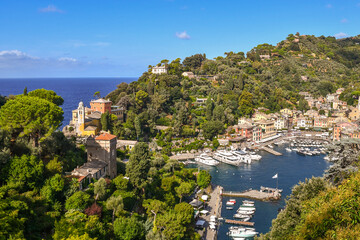 Elevated view of the famous holiday resort with the small harbour on the Italian Riviera in summer,...