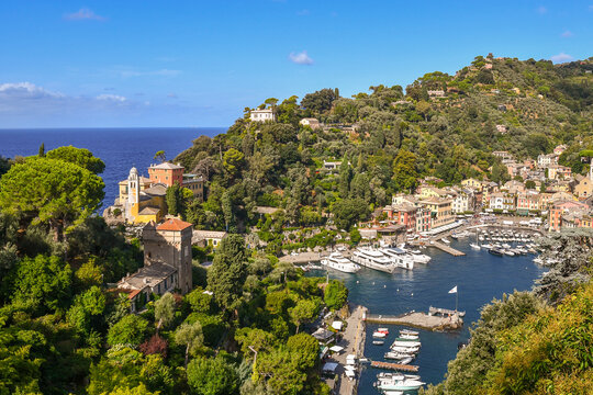 Elevated view of the famous holiday resort with the small harbour on the Italian Riviera in summer, Portofino, Genoa, Liguria, Italy	