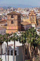cityscape of church and buildings in Malaga - 744585423