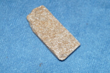 stone on a blue background