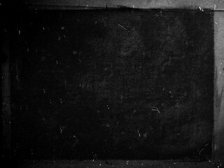 Black grunge scratched background, obsolete texture, old film effect - 744586220