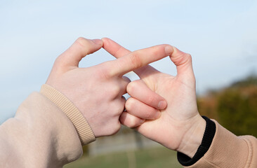 Newly Wed Couple Joining Hands in Infinity Love Sign