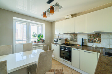 interior kitchen and dining room, refectory area, cooking equipment, table furniture, stove
