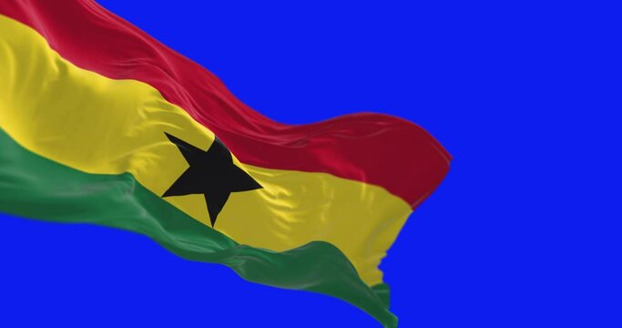 National flag of Ghana waving isolated on blue background