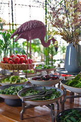 greens and vegetables in the open buffet used for breakfast service
