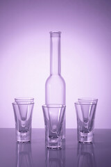 Beautiful glassware illuminated by backlight with helium filters creating a captivating scene