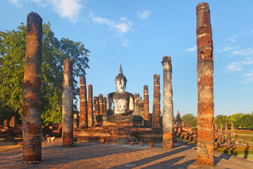 Fototapeta na wymiar Ruins of the Sukhothai Historical Park at dusk, Thailand