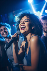 Curly hair woman and friends laughing and singing along at karaoke club.