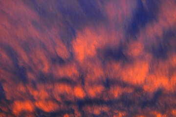 Bright red evening clouds  at sunset