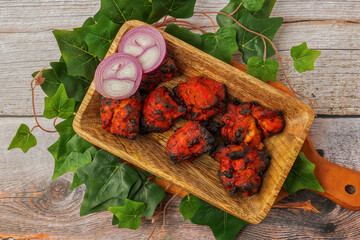 Famous Indian non veg appetizer , spicy dish called Achari chicken kebab also called Chicken kebab. Made with spices and herbs. Chicken tandoori kabab for lunch or dinner served hot and eat with rice