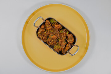 Sukha mutton or chicken, dry spicy Murgh or goat meat served hot,  mutton fry, special hot spicy traditional dish. Buffalo roast, meat pepper fry.