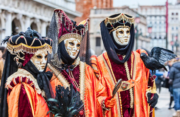 Fototapeta na wymiar Portrait of Disguised Persons - Venice Carnival 