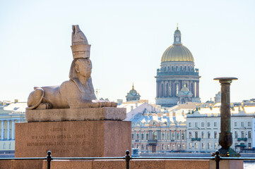 Sphinx on the University embankment and St. Isaac's Cathedral in St. Petersburg (inscription...