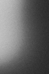 Fotobehang Black and white grainy gradient background. © andrik