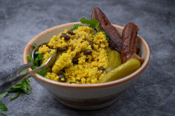 Vegan sausages and millet,  made of seitan. Asian bowl.