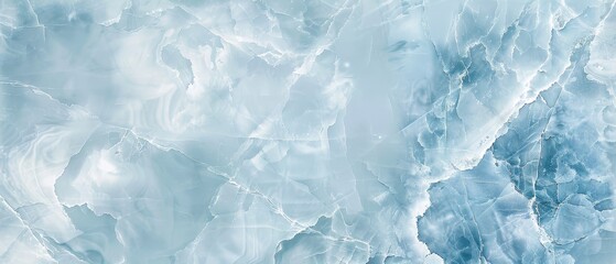 This image portrays the cool tranquility of ice blue marble with soft white veining, reminiscent of a frozen landscape under a winter sky.