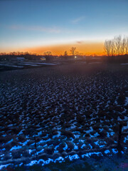 Sunset Over Farmland Partially Covered with Snow, Plain City, Ohio