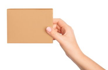 A woman's hand holds a cardboard box on an empty background.