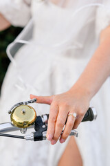 hands ringing bicycle bell