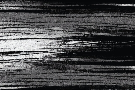 Black and white grunge texture. Brush strokes. Vector grunge overlay texture. Black and white background. Abstract monochrome image includes a faded effect in dark tones.