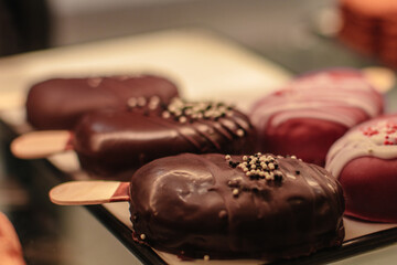 Chocolate delicious sweet cake in the shape of a popsicle