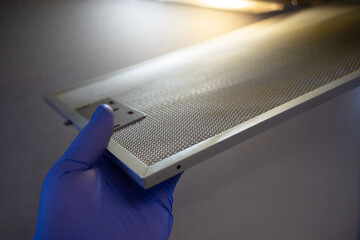 A fat filter for the hood in the kitchen.Clean the duct filter in the kitchen.